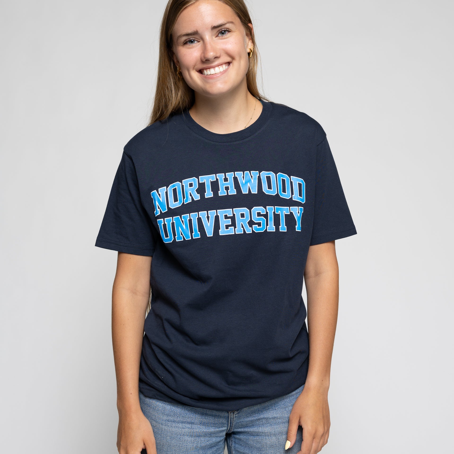 Girl wearing northwood navy tshirt