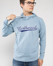 Boy wearing light blue Northwood hoodie